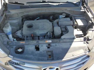 2017 Hyundai Santa Fe 2.4L z VIN 5NMZU3LB2HH025486, wystawiony jako Copart lot #58055185 z przebiegiem 120 364 mil mil oraz Szkoda całkowita • Salvage title. Historia ofert i sprzedaży dostępna na DreamBid. Obrazek 12.