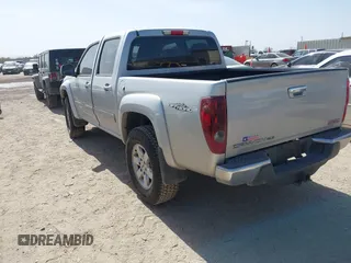 2010 GMC Canyon SLE1 z VIN 1GTJSCDEXA8130361, wystawiony jako IAAI lot #41734671 z przebiegiem 52 621 mil mil oraz . Historia ofert i sprzedaży dostępna na DreamBid. Obrazek 3.
