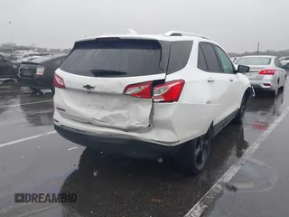 2021 Chevrolet Equinox Premier z VIN 2GNAXNEV7M6112087, wystawiony jako IAAI lot #41102702 z przebiegiem 32 995 mil mil oraz . Historia ofert i sprzedaży dostępna na DreamBid. Obrazek 6.