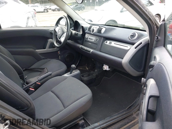 2014 Smart fortwo Pure with VIN WMEEJ3BA8EK747384, listed as a IAAI auction lot 41979651 with 29,586 mi miles and . Bid and sale history available at DreamBid. Image 5.
