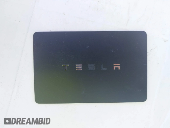 2018 Tesla Model 3 Long Range Battery with VIN 5YJ3E1EA7JF020173, listed as a IAAI auction lot 42046312 with 83,395 mi miles and . Bid and sale history available at DreamBid. Image 11.