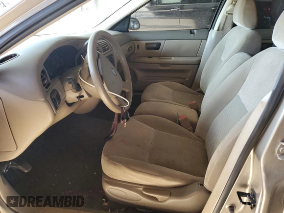 2007 Ford Taurus SE с VIN 1FAFP53UX7A119332, выставлен на аукционе Copart как лот 57625215 с пробегом 54 443 миль миль и Списание • Salvage title. История ставок и продаж доступна на DreamBid. Изображение 7.