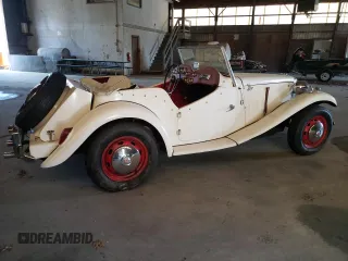 1971 Volkswagen Beetle with VIN 1112313102, listed as a Copart auction lot 55659265 with 3,677 mi miles and Salvage Title. Bid and sale history available at DreamBid. Image 3.