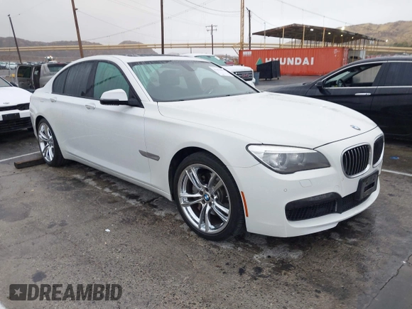 2013 BMW 7 Series 740i with VIN WBAYA6C57DC995338, listed as a IAAI auction lot 41479077 with 123,680 mi miles and . Bid and sale history available at DreamBid. Image 1.