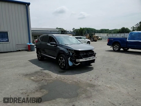 2018 Honda CR-V Touring with VIN 7FARW2H93JE048507, listed as a Copart auction lot 64071705 with 69,051 mi miles and Salvage title. Bid and sale history available at DreamBid. Image 15.
