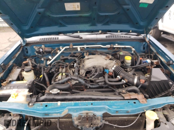2002 Nissan Frontier XE with VIN 1N6ED27Y72C300957, listed as a Copart auction lot 63192525 with 179,444 mi miles and Clean title. Bid and sale history available at DreamBid. Image 11.