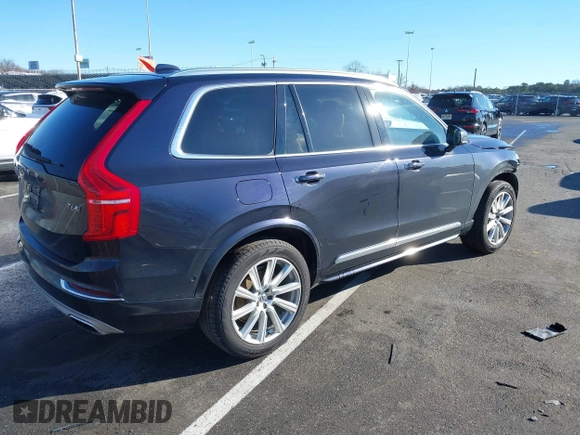 2017 Volvo XC90 Inscription with VIN YV4A22PL7H1142570, listed as a IAAI auction lot 41173079 with 165,647 mi miles. Bid and sale history available at carsss.com. Image 4.