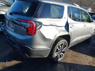 2021 GMC Acadia SLT with VIN 1GKKNMLS6MZ190391, listed as a IAAI auction lot 41353351 with 104,851 mi miles. Bid and sale history available at carsss.com. Image 4.