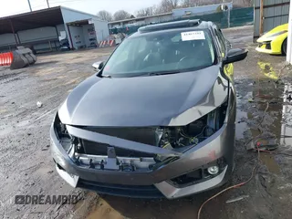 2018 Honda Civic EX-L z VIN JHMFC1F85JX014701, wystawiony jako IAAI lot #41467342 z przebiegiem 50 292 mil mil oraz . Historia ofert i sprzedaży dostępna na DreamBid. Obrazek 13.
