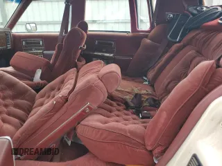 1991 Cadillac Brougham z VIN 1G6DW5474MR703030, wystawiony jako Copart lot #64687894 z przebiegiem 161 866 mil mil oraz Szkody całkowita. Historia ofert i sprzedaży dostępna na DreamBid. Obrazek 11.