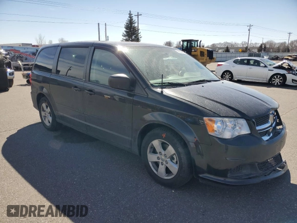 2014 Dodge Grand Caravan SE with VIN 2C4RDGBG2ER341797, listed as a Copart auction lot 49439405 with 102,633 mi miles and Salvage Title. Bid and sale history available at DreamBid. Image 4.
