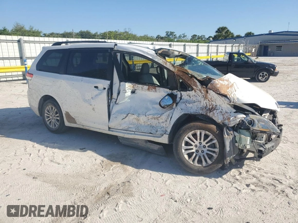 2014 Toyota Sienna XLE with VIN 5TDYK3DC4ES457160, listed as a Copart auction lot 48921425 with 0 mi miles and Salvage Title. Bid and sale history available at carsss.com. Image 4.