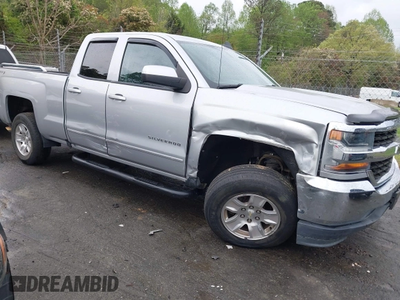 2018 Chevrolet Silverado 1500 LT with VIN 1GCVKREC7JZ151678, listed as a IAAI auction lot 41972011 with 106,892 mi miles and . Bid and sale history available at DreamBid. Image 6.