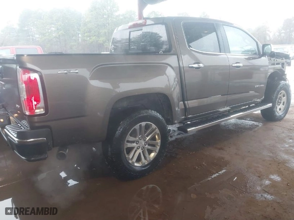 2016 GMC Canyon 4WD SLT with VIN 1GTG6DE35G1100042, listed as a IAAI auction lot 41387193 with 198,004 mi miles. Bid and sale history available at carsss.com. Image 4.