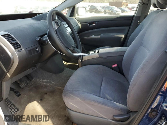 2008 Toyota Prius z VIN JTDKB20U687712274, wystawiony jako Copart lot #89291475 z przebiegiem 123 500 mil mil oraz Nie do naprawy • Non repairable. Historia ofert i sprzedaży dostępna na DreamBid. Obrazek 7.