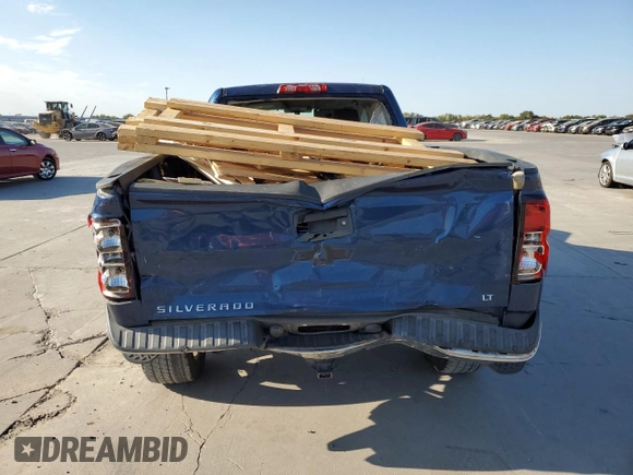 2015 Chevrolet Silverado 1500 LT with VIN 1GCRCREC9FZ173994, listed as a Copart auction lot 77023834 with 107,624 mi miles and Salvage Title. Bid and sale history available at DreamBid. Image 6.