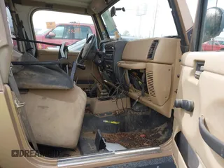 1999 Jeep Wrangler Sahara with VIN 1J4FY49S6XP437964, listed as a IAAI auction lot 41947995 with 118,566 mi miles. Bid and sale history available at carsss.com. Image 5.