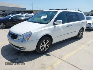 2014 Kia Sedona EX with VIN KNDMH4C76E6554982, listed as a IAAI auction lot 41980362 with 164,380 mi miles and . Bid and sale history available at DreamBid. Image 2.