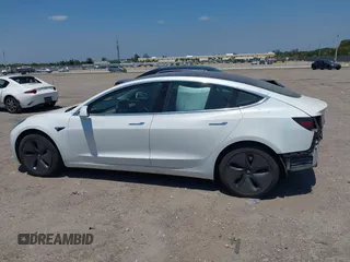 2018 Tesla Model 3 Long Range Battery with VIN 5YJ3E1EAXJF027179, listed as a IAAI auction lot 42059918 with 43,566 mi miles. Bid and sale history available at carsss.com. Image 15.