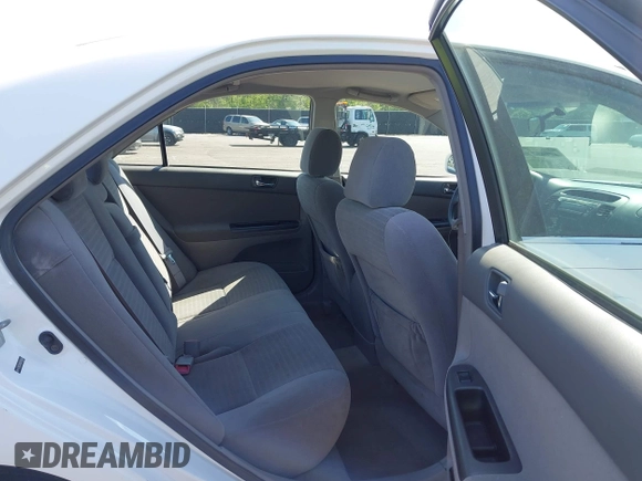 2006 Toyota Camry STD with VIN 4T1BE32KX6U734944, listed as a IAAI auction lot 42006245 with 243,967 mi miles. Bid and sale history available at carsss.com. Image 8.