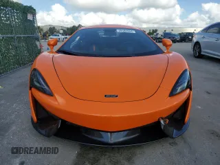 2017 McLaren 570S z VIN SBM13DAA7HW001866, wystawiony jako Copart lot #59182654 z przebiegiem 32 951 mil mil oraz Szkody całkowita. Historia ofert i sprzedaży dostępna na DreamBid. Obrazek 5.