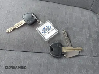 2004 Hyundai Accent GL z VIN KMHCG45C04U502892, wystawiony jako IAAI lot #42309078 z przebiegiem 127 362 mil mil oraz . Historia ofert i sprzedaży dostępna na DreamBid. Obrazek 11.