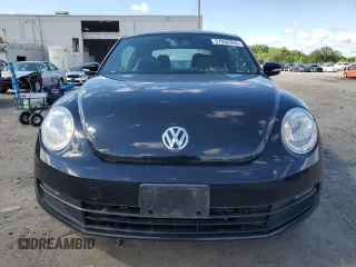 2013 Volkswagen Beetle 2.5L w/Sun/Sound/Nav с VIN 3VWJP7AT9DM676108, выставлен на аукционе Copart как лот 57050355 с пробегом 107 518 миль миль и Чистый • Clean title. История ставок и продаж доступна на DreamBid. Изображение 5.