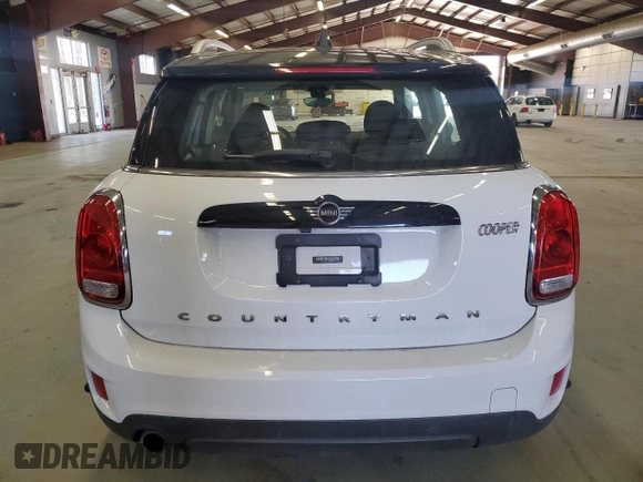 2019 MINI Countryman Cooper with VIN WMZYV5C54K3F58009, listed as a Copart auction lot 53679575 with 104,735 mi miles and Salvage title. Bid and sale history available at DreamBid. Image 6.