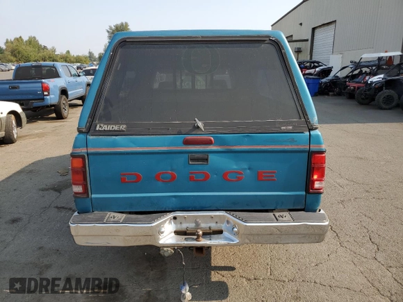 1994 Dodge Dakota z VIN 1B7GG23X3RW126913, wystawiony jako Copart lot #69046074 z przebiegiem 308 676 mil mil oraz Szkoda całkowita • Salvage title. Historia ofert i sprzedaży dostępna na DreamBid. Obrazek 6.
