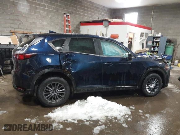 2020 Mazda CX-5 Touring z VIN JM3KFBCM9L0843045, wystawiony jako IAAI lot #41361008 z przebiegiem 76 107 mil mil oraz . Historia ofert i sprzedaży dostępna na DreamBid. Obrazek 13.