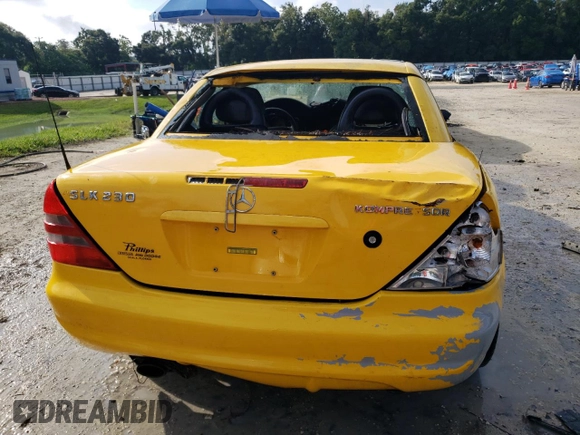 1999 Mercedes-Benz SLK-Class with VIN WDBKK47F9XF076441, listed as a Copart auction lot 73745154 with 104,481 mi miles and Salvage Title. Bid and sale history available at carsss.com. Image 6.