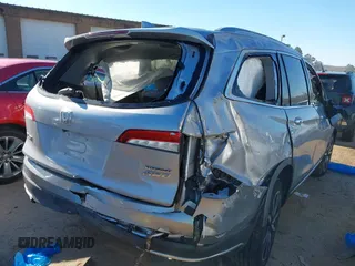 2019 Honda Pilot Touring 7-Passenger with VIN 5FNYF6H60KB038846, listed as a IAAI auction lot 41339385 with Not provided miles and . Bid and sale history available at DreamBid. Image 6.