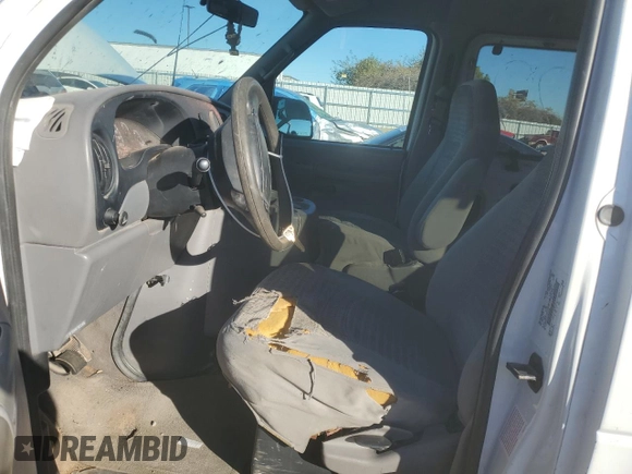 2002 Ford Econoline Passenger XL with VIN 1FBSS31S82HB36096, listed as a Copart auction lot 80654574 with 170,656 mi miles and Salvage title. Bid and sale history available at DreamBid. Image 7.