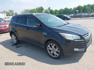 2015 Ford Escape Titanium with VIN 1FMCU9J96FUB58519, listed as a IAAI auction lot 42429369 with 125,541 mi miles and . Bid and sale history available at DreamBid. Image 1.