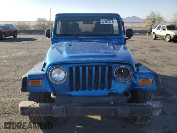 2003 Jeep Wrangler X z VIN 1J4FA39S33P320254, wystawiony jako Copart lot #52392525 z przebiegiem 206 325 mil mil oraz Szkoda całkowita • Salvage title. Historia ofert i sprzedaży dostępna na DreamBid. Obrazek 5.