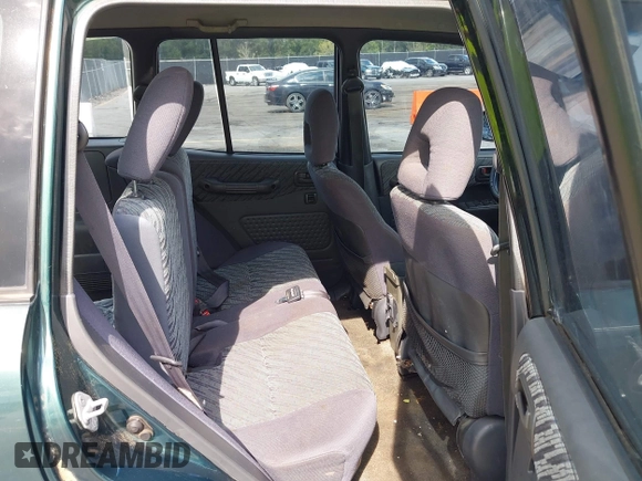1999 Toyota RAV4 with VIN JT3GP10V4X7052720, listed as a IAAI auction lot 42490948 with 321,165 mi miles and . Bid and sale history available at DreamBid. Image 8.