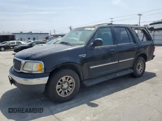 2000 Ford Expedition XLT with VIN 1FMRU15L2YLB89597, listed as a Copart auction lot 60911465 with 115,921 mi miles and Salvage title. Bid and sale history available at DreamBid. Image 1.