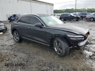 2023 Genesis GV70 Advanced with VIN 5NMMCET14PH000281, listed as a Copart auction lot 57876395 with 24,842 mi miles and Salvage title. Bid and sale history available at DreamBid. Image 4.
