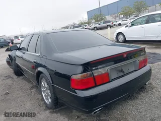 2002 Cadillac Seville Touring STS with VIN 1G6KY54982U239673, listed as a IAAI auction lot 41657709 with 92,224 mi miles. Bid and sale history available at carsss.com. Image 3.