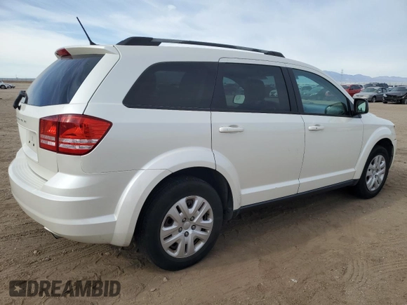 2017 Dodge Journey SE with VIN 3C4PDCAB2HT675948, listed as a Copart auction lot 54778875 with 84,544 mi miles and Salvage Title. Bid and sale history available at DreamBid. Image 3.