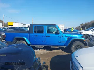 2021 Jeep Gladiator Willys with VIN 1C6HJTAG3ML572690, listed as a IAAI auction lot 41649907 with 74,734 mi miles and . Bid and sale history available at DreamBid. Image 14.
