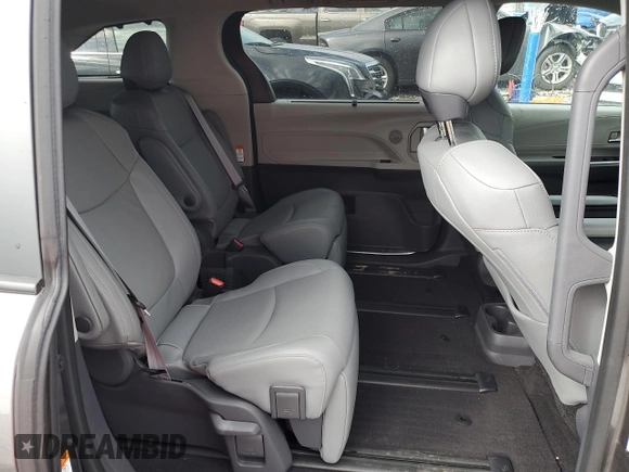2021 Toyota Sienna Limited z VIN 5TDZRKEC6MS039819, wystawiony jako Copart lot #56318785 z przebiegiem Nie podano mil oraz Szkoda całkowita • Salvage title. Historia ofert i sprzedaży dostępna na DreamBid. Obrazek 11.