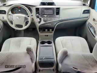 2014 Toyota Sienna LE with VIN 5TDJK3DC5ES093932, listed as a Copart auction lot 63611985 with 142,044 mi miles and Salvage title. Bid and sale history available at DreamBid. Image 8.