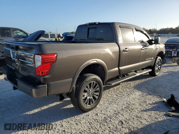 2016 Nissan Titan XD Platinum Reserve with VIN 1N6BA1F25GN506566, listed as a Copart auction lot 74627704 with 87,012 mi miles and Salvage Title. Bid and sale history available at carsss.com. Image 3.