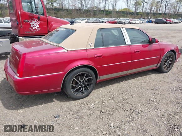 2006 Cadillac DTS w/1SE with VIN 1G6KD57996U113240, listed as a IAAI auction lot 42120004 with 120,806 mi miles. Bid and sale history available at carsss.com. Image 4.
