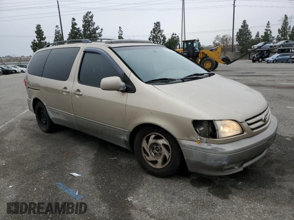 2001 Toyota Sienna LE with VIN 4T3ZF13C01U333507, listed as a Copart auction lot 86604984 with 192,377 mi miles and Salvage Title. Bid and sale history available at DreamBid. Image 4.