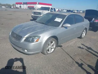 2005 Nissan Altima 3.5 SE with VIN 1N4BL11D05C239986, listed as a IAAI auction lot 41866344 with 212,087 mi miles. Bid and sale history available at carsss.com. Image 2.