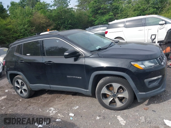 2018 Jeep Compass Latitude with VIN 3C4NJCBB8JT124640, listed as a IAAI auction lot 42182791 with 179,376 mi miles and . Bid and sale history available at DreamBid. Image 13.