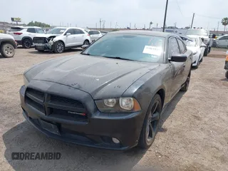2014 Dodge Charger SXT with VIN 2C3CDXHG3EH122158, listed as a IAAI auction lot 41861010 with 122,842 mi miles. Bid and sale history available at carsss.com. Image 2.