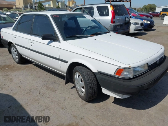 1990 Toyota Camry z VIN JT2SV21E9L0352085, wystawiony jako IAAI lot #42419588 z przebiegiem 138 425 mil mil oraz . Historia ofert i sprzedaży dostępna na DreamBid. Obrazek 1.